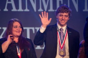 Andy Norris of Bellevue DECA receives his award for Finalist in Sales Management, presented at the Collegiate DECA 2015 ICDC